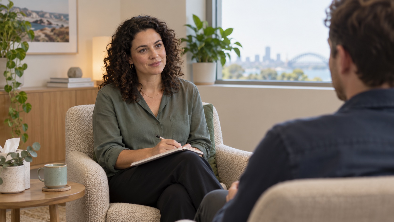 Mental health clinician talking with a client